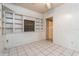 Small dining area with built in shelving and tiled floor at 1624 Grand St, Orlando, FL 32805