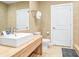 Clean bathroom with toilet and modern vanity at 3062 Rockefeller Way, Kissimmee, FL 34747