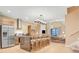 Open concept kitchen with large island and breakfast bar at 3062 Rockefeller Way, Kissimmee, FL 34747