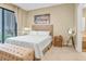 Spacious bedroom with king-size bed and access to patio at 3062 Rockefeller Way, Kissimmee, FL 34747