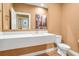 Modern bathroom with floating vanity and a toilet at 3062 Rockefeller Way, Kissimmee, FL 34747