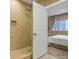 Bathroom with walk-in shower and modern fixtures at 3062 Rockefeller Way, Kissimmee, FL 34747