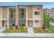 Modern two-story townhouse with large windows at 3062 Rockefeller Way, Kissimmee, FL 34747