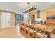 Island kitchen with modern fixtures and ample counter space at 3062 Rockefeller Way, Kissimmee, FL 34747