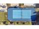 Overhead view of a well-maintained tennis court at 3062 Rockefeller Way, Kissimmee, FL 34747