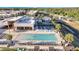 Resort-style pool with lounge chairs and community building at 3062 Rockefeller Way, Kissimmee, FL 34747