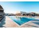 Resort-style pool with plenty of lounge chairs at 3062 Rockefeller Way, Kissimmee, FL 34747