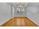 Bright dining room with hardwood floors and chandelier at 902 Towhee Ct, Celebration, FL 34747