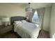 Bright bedroom featuring a comfortable double bed and ample natural light at 14563 Orchid Island Dr, Orlando, FL 32827