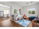 Playroom with hardwood floors, toys, and a view into home gym at 5507 Worsham Court, Windermere, FL 34786