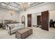 Spacious main bedroom with sitting area and large doors at 5507 Worsham Court, Windermere, FL 34786