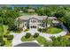 Luxury home with circular driveway and lake view at 5507 Worsham Court, Windermere, FL 34786