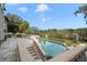 Inviting swimming pool with expansive backyard and landscape at 5507 Worsham Court, Windermere, FL 34786