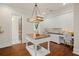 Bright laundry room with workspace and wooden center island at 5507 Worsham Court, Windermere, FL 34786