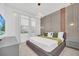 Bright and airy bedroom with a king-size bed and modern decor at 6115 High Seas Dr, Orlando, FL 32821