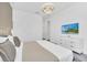 Bright bedroom with a large bed and dresser at 6115 High Seas Dr, Orlando, FL 32821