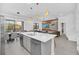 Modern kitchen with island and stainless steel appliances at 6115 High Seas Dr, Orlando, FL 32821