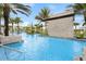 Relaxing pool with a stone waterfall feature at 6115 High Seas Dr, Orlando, FL 32821