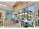 Community room with large windows overlooking the pool at 6115 High Seas Dr, Orlando, FL 32821
