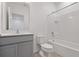 Clean bathroom with gray vanity and tile shower/tub combo at 6115 High Seas Dr, Orlando, FL 32821