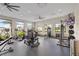Well-equipped gym with strength training and cardio equipment at 6115 High Seas Dr, Orlando, FL 32821