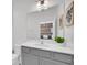 Bathroom with a vanity and large mirror at 6115 High Seas Dr, Orlando, FL 32821