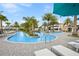 Relaxing resort pool with lounge chairs and palm trees at 6115 High Seas Dr, Orlando, FL 32821