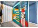 Bunk beds and a rocket ship themed wall in this playful ' bedroom at 6115 High Seas Dr, Orlando, FL 32821