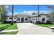 Beautiful house exterior with a paver driveway and lush lawn at 32702 View Haven Ln, Sorrento, FL 32776