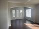 Bright living area with hardwood floors and sunlight at 2887 Sweetspire Cir, Kissimmee, FL 34746