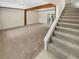 Finished basement with a carpeted floor and access to the backyard at 326 Banyan Dr, Maitland, FL 32751