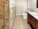 Bathroom with a walk-in shower, tile flooring, and a modern vanity at 326 Banyan Dr, Maitland, FL 32751