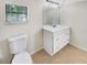 Clean bathroom with white vanity and tiled floor at 326 Banyan Dr, Maitland, FL 32751