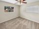 Bright bedroom featuring carpet and window blinds at 326 Banyan Dr, Maitland, FL 32751