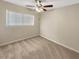 Bright bedroom with neutral walls and carpet at 326 Banyan Dr, Maitland, FL 32751