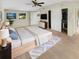 Main bedroom with a king-size bed, ceiling fan, and large closet at 326 Banyan Dr, Maitland, FL 32751