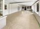 Large screened porch with tile flooring at 326 Banyan Dr, Maitland, FL 32751