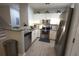 Modern kitchen with stainless steel appliances and granite counters at 8947 Shine Dr, Kissimmee, FL 34747