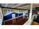 Spacious bedroom with hardwood floors and unique window design at 120 S Thornton Ave, Orlando, FL 32801