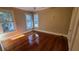 Spacious bedroom with hardwood floors and windows at 120 S Thornton Ave, Orlando, FL 32801