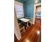 Cozy breakfast nook with white table and built-in bench seating at 120 S Thornton Ave, Orlando, FL 32801