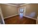 Hardwood floors and an archway leading to another room at 120 S Thornton Ave, Orlando, FL 32801