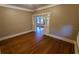 Hardwood floors and an archway leading to another room at 120 S Thornton Ave, Orlando, FL 32801