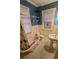Charming bathroom with clawfoot tub and pedestal sink at 120 S Thornton Ave, Orlando, FL 32801