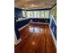Bright bedroom with hardwood floors and dormer windows at 120 S Thornton Ave, Orlando, FL 32801
