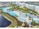 Aerial view of resort pool and surrounding buildings at 3054 Pirate Way, Kissimmee, FL 34747