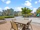 Shared patio area with tables and chairs, near a playground at 3054 Pirate Way, Kissimmee, FL 34747