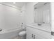 Bathroom with a bathtub and single vanity at 3606 Walking Stick Way, Poinciana, FL 34759