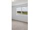 Bright bedroom with water views and neutral carpeting at 3606 Walking Stick Way, Poinciana, FL 34759