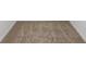 Neutral carpeted bedroom with white walls and baseboards at 3606 Walking Stick Way, Poinciana, FL 34759